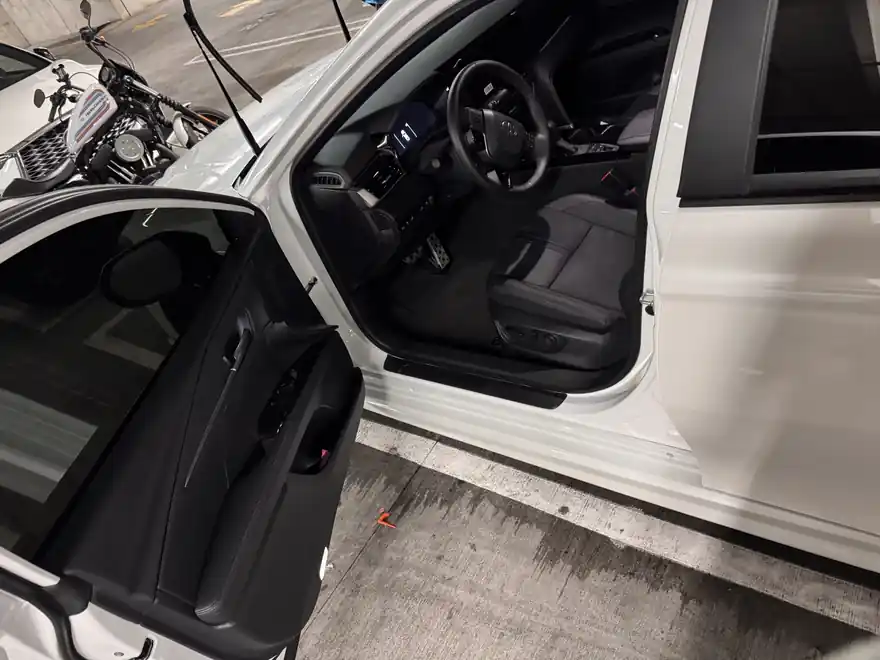 Clean Toyota Camry interior with the driver door open